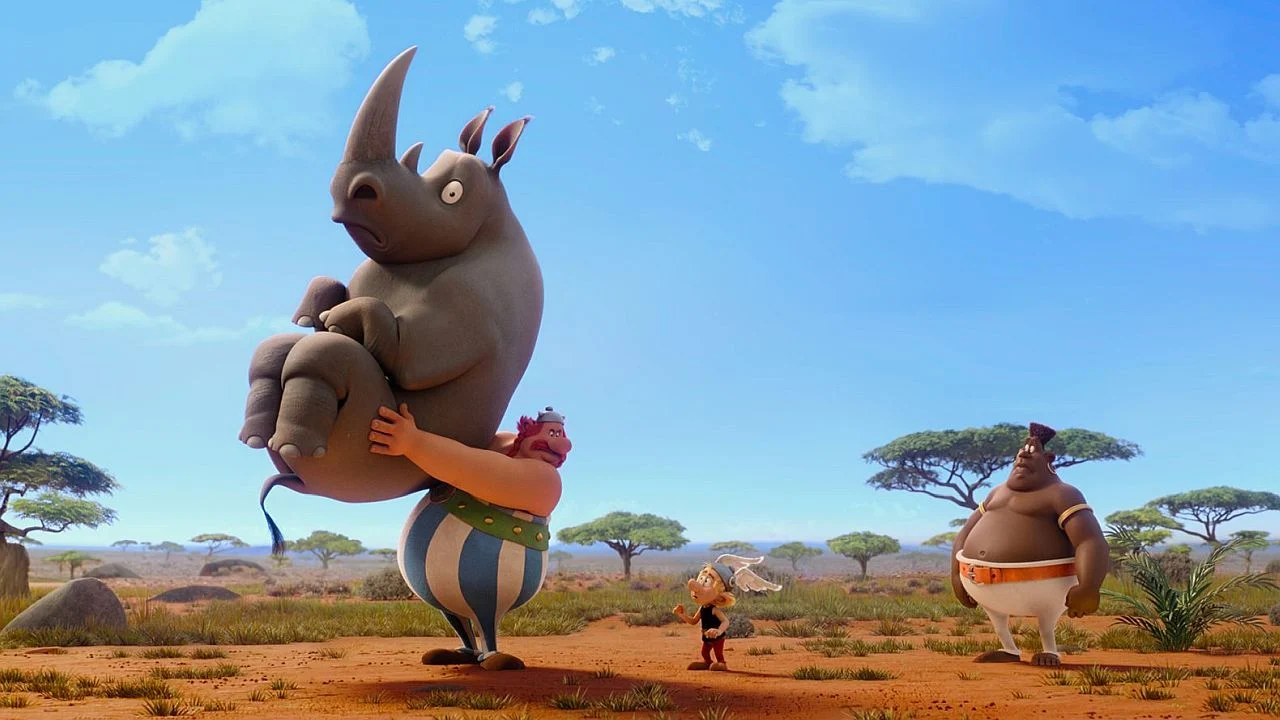 Poster des Films "Asterix und das Königreich Nubien" mit den Hauptfiguren Asterix und Obelix im Vordergrund